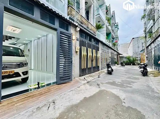 Nhà 52m2, xe hơi ngủ trong nhà, gần chợ và trường học, giá 6 tỷ tại Phường Gò Vấp